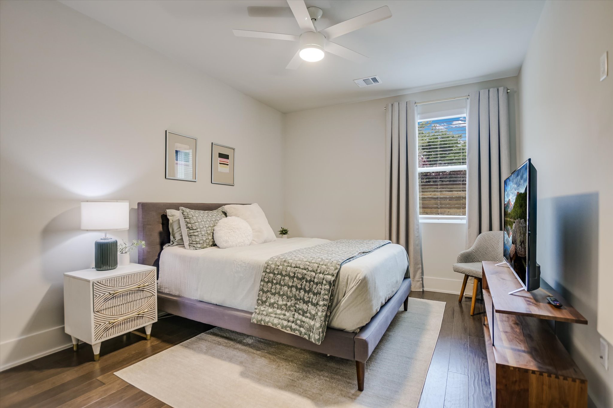 5212 Pink Poppy Pass, Unit 20 Austin, TX 78735 - Photo 14 of 24 Bedroom with ceiling fan and dark wood finished floors