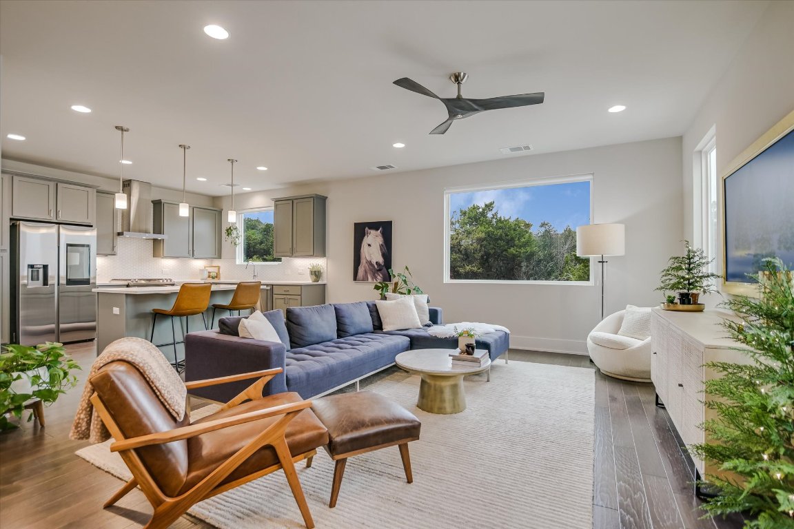 5212 Pink Poppy Pass, Unit 20 Austin, TX 78735 - Photo 4 of 24 Living room featuring dark wood-type flooring, a ceiling fan, and recessed lighting