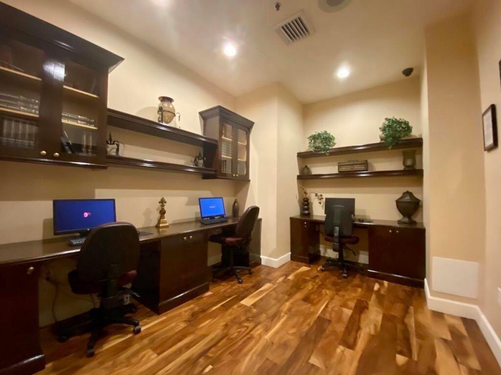 616 Clearwater Park Road, Unit 413 West Palm Beach, FL 33401 - Photo 12 of 21 a kitchen with stainless steel appliances granite countertop a refrigerator and a stove