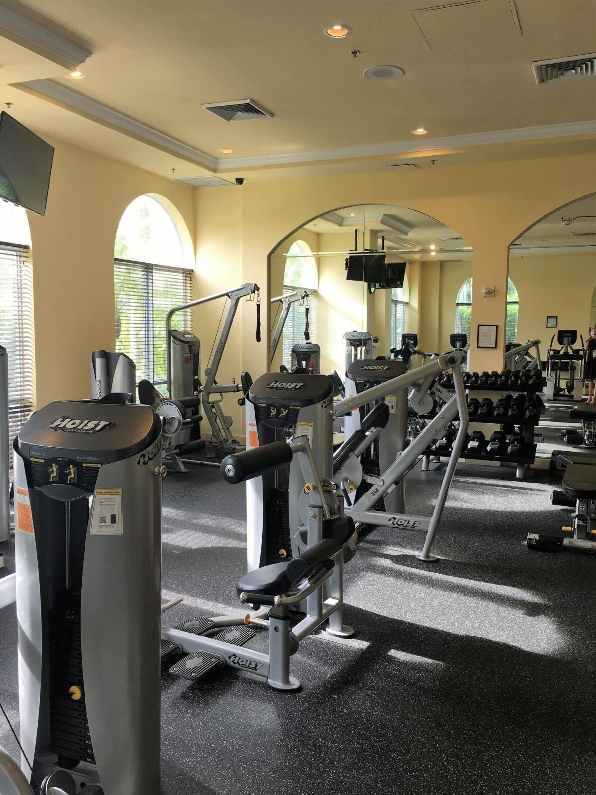 616 Clearwater Park Road, Unit 413 West Palm Beach, FL 33401 - Photo 13 of 21 a view of a room with gym equipment