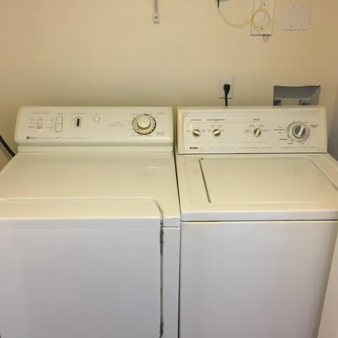 a close up view of washer and dryer