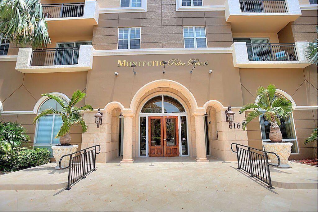 616 Clearwater Park Road, Unit 413 West Palm Beach, FL 33401 - Photo 9 of 21 a front view of a multi story residential apartment building