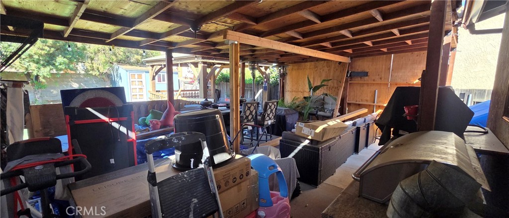 1548 Ranch Road San Bernardino, CA 92407 - Photo 18 of 26 a view of a room with gym equipment