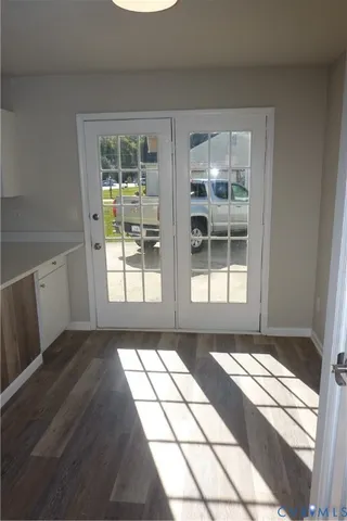 a front view of a house with a large window