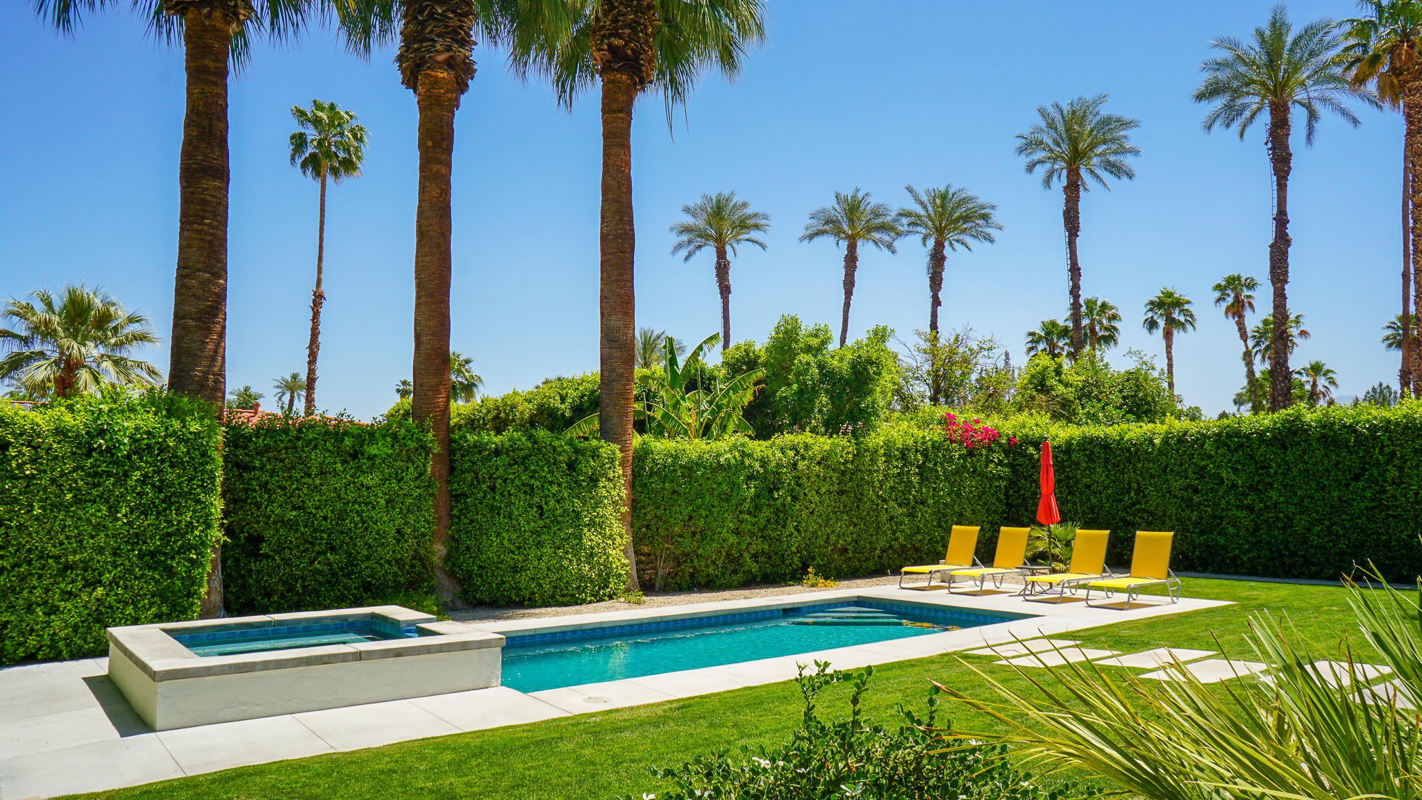 37356 Palmdale Road Rancho Mirage, CA 92270 - Photo 24 of 27 a view of a yard with a table and chairs