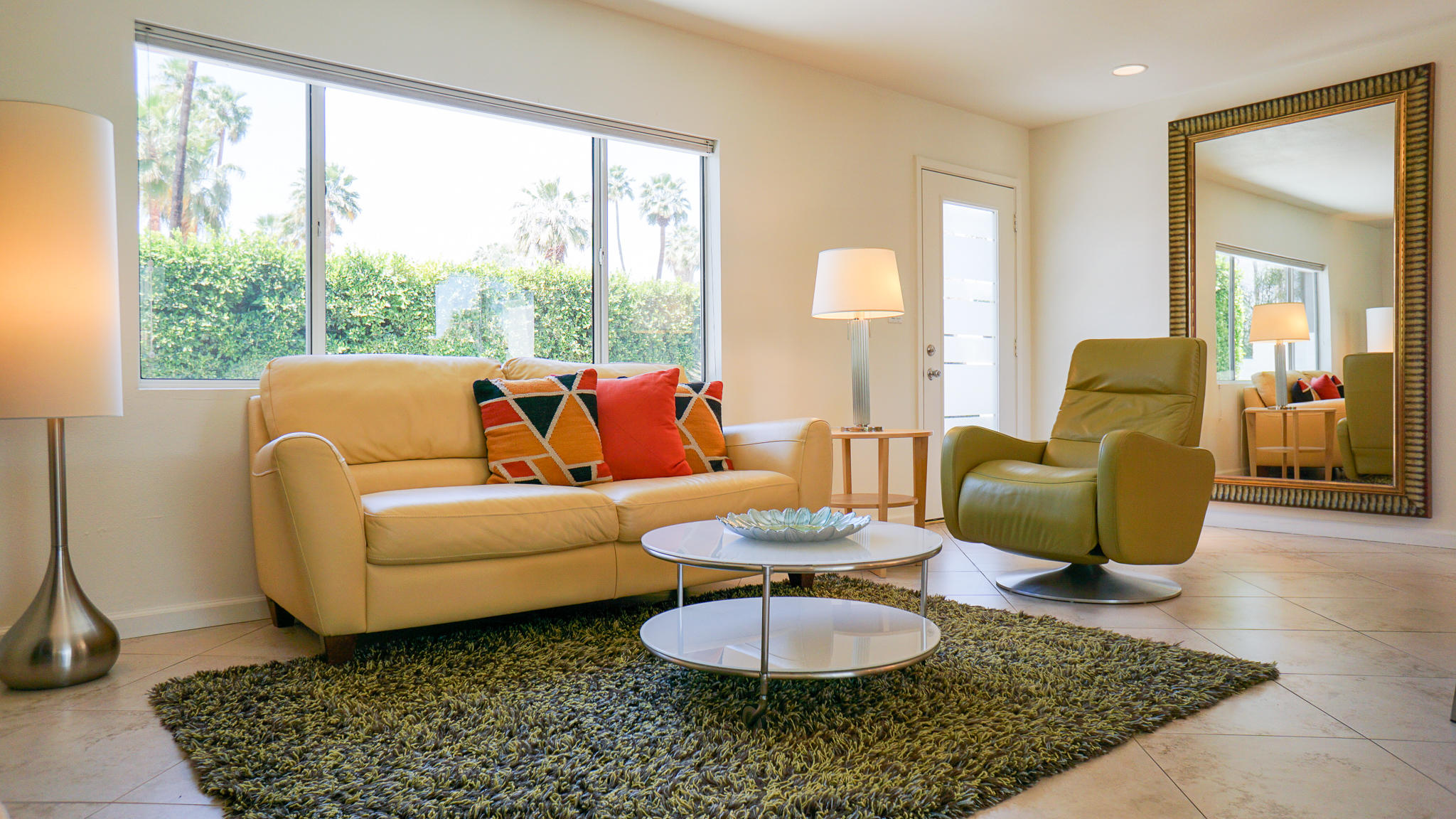 37356 Palmdale Road Rancho Mirage, CA 92270 - Photo 9 of 27 a living room with furniture and a large window