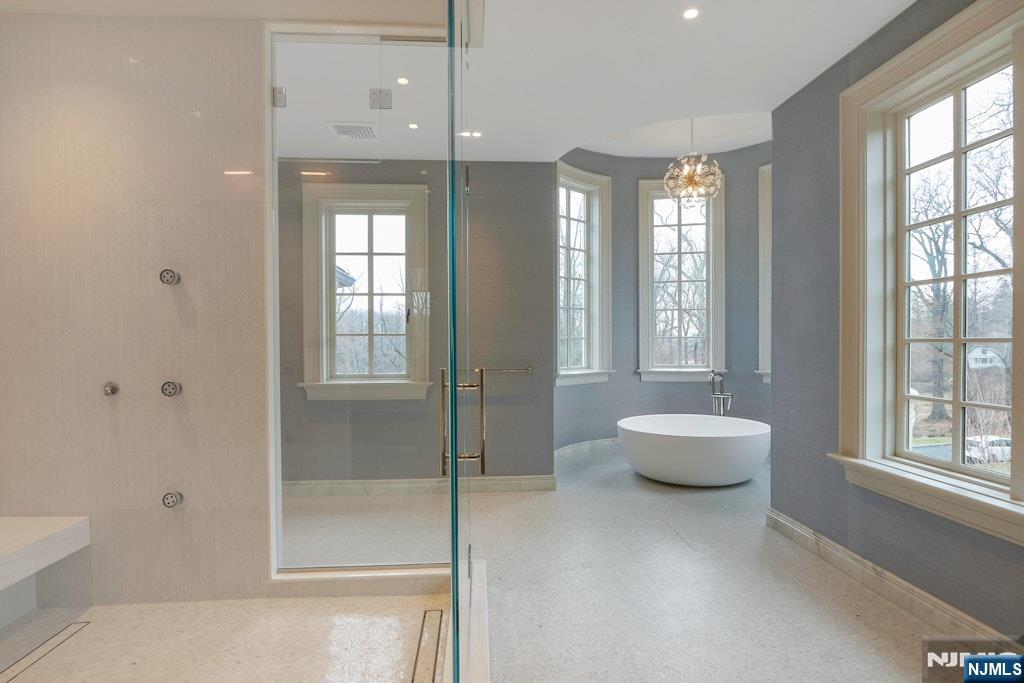 10 Frick Drive Alpine, NJ 07620 - Photo 17 of 28 a bathroom with a toilet sink and shower