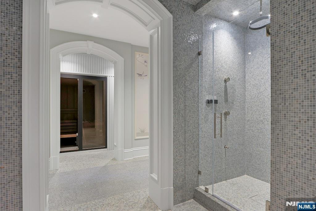 10 Frick Drive Alpine, NJ 07620 - Photo 21 of 28 a view of bathroom with a toilet sink and shower