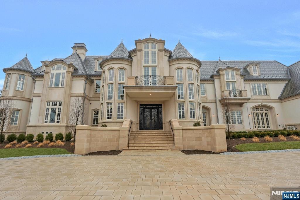 10 Frick Drive Alpine, NJ 07620 - Photo 25 of 28 a front view of residential houses with yard