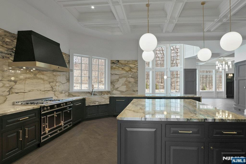 10 Frick Drive Alpine, NJ 07620 - Photo 6 of 28 a large kitchen with granite countertop a stove and a sink