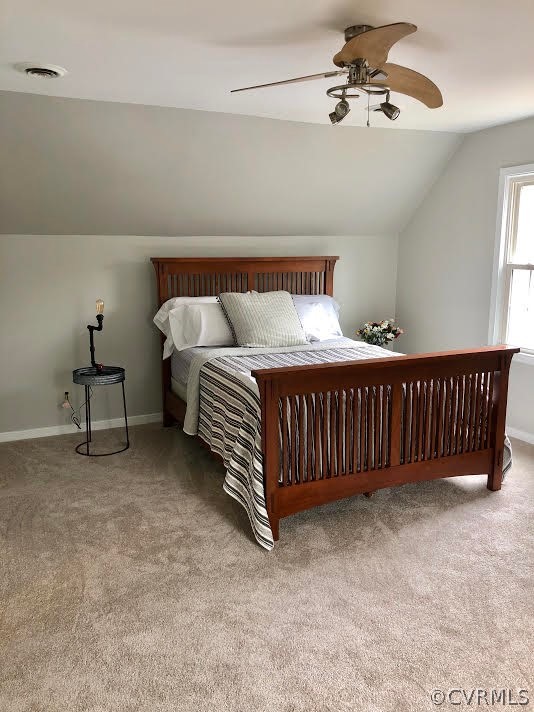 5012 Wilconna Road Chesterfield, VA 23832 - Photo 12 of 14 a bedroom with a bed and a chandelier