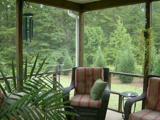 65 Landmark N Road Roxboro, NC 27574 - Photo 11 of 12 RELAX ON THE SCREENED IN BACK PORCH