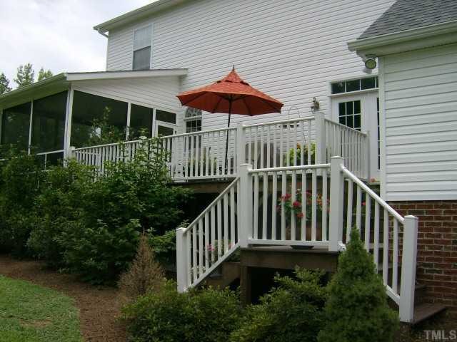65 Landmark N Road Roxboro, NC 27574 - Photo 12 of 12 AWESOME REAR DECK CAN BE ACCESSED FROM THE SCREENED PORCH OR LIVING AREA. SIT AND ENJOY THE QUIET AND NATURE