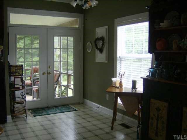 65 Landmark N Road Roxboro, NC 27574 - Photo 6 of 12 BREAKFAST AREA WITH FRENCH DOORS TO BACK SCREENED PORCH