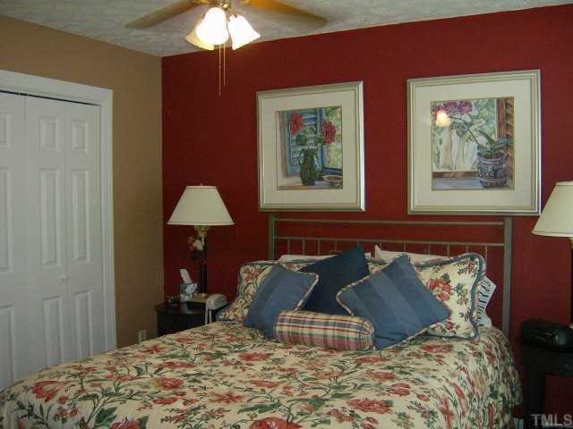 65 Landmark N Road Roxboro, NC 27574 - Photo 10 of 12 UPSTAIRS FRONT BEDROOM HAS REALLY PRETTY COLOR SCHEME