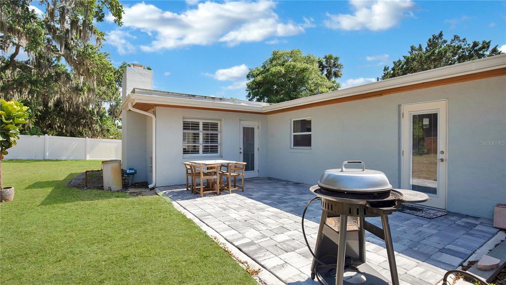 207 Hubbell Street Edgewater, FL 32132 - Photo 11 of 46 back paver patio