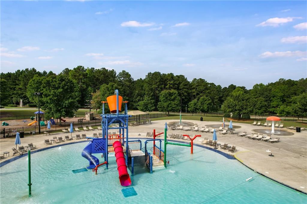 139 Manchester Lane Villa Rica, GA 30180 - Photo 56 of 60 a childrens park with lots of swings and slides