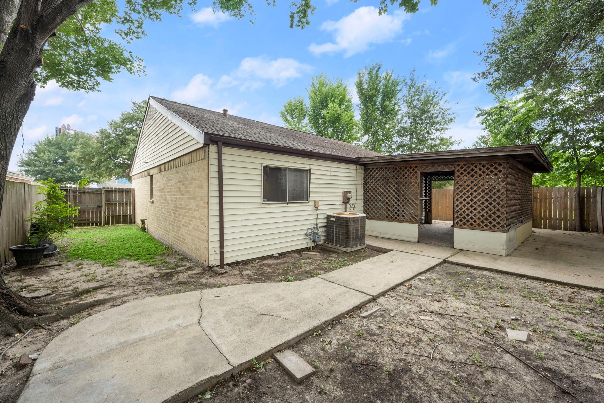 11718 Ridge Run Drive Houston, TX 77064 - Photo 8 of 17 a view of a house with a yard