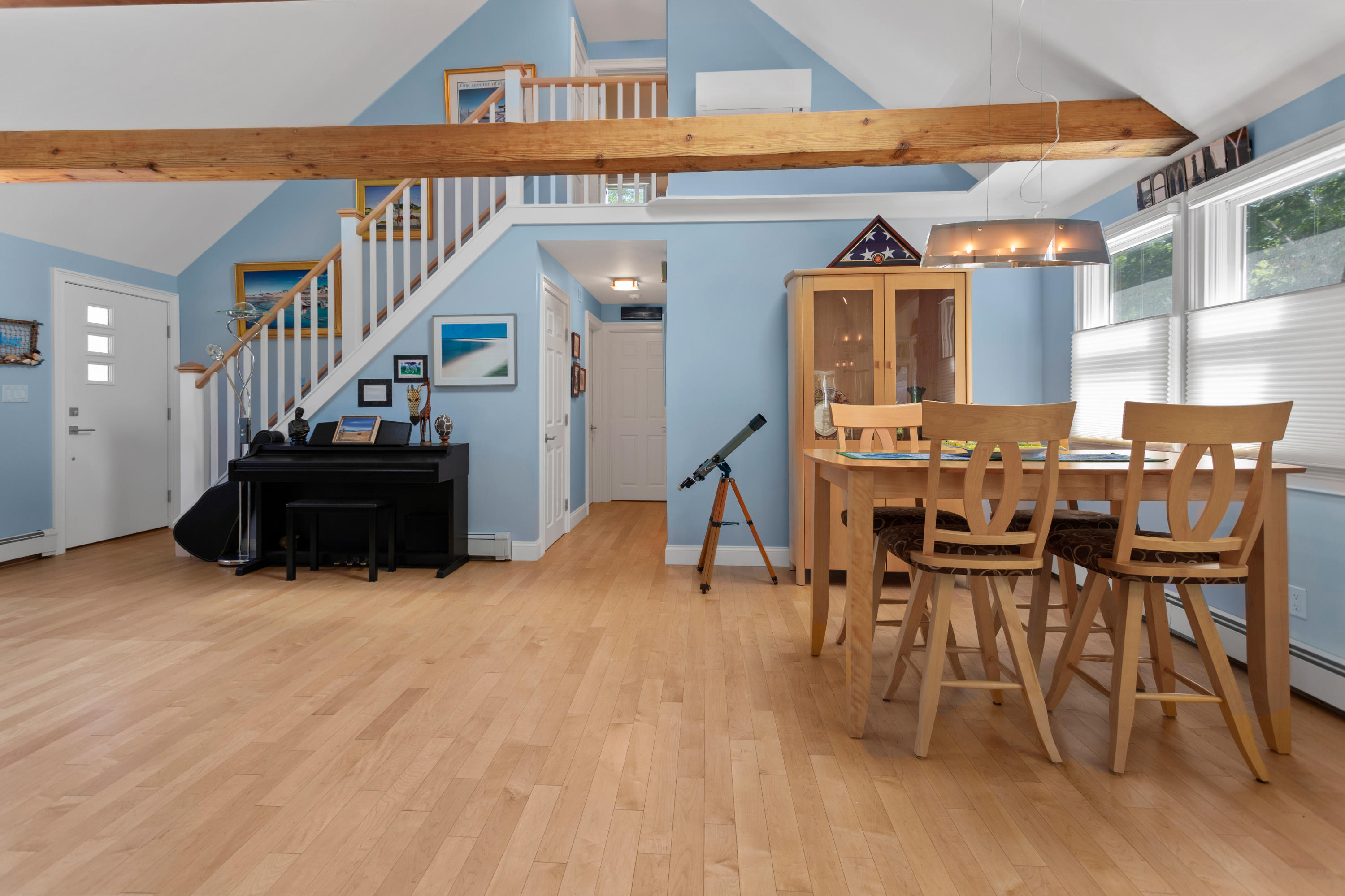 270 Hay Road Eastham, MA 02642 - Photo 13 of 42 a view of a livingroom with furniture and stairs