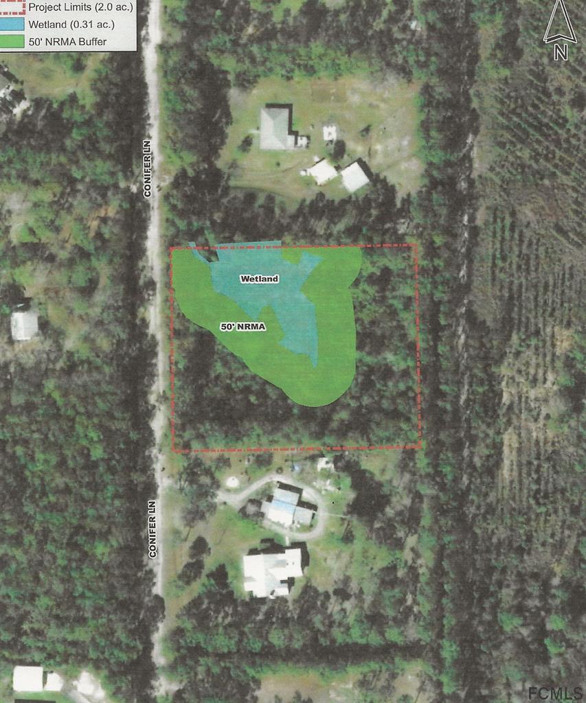 220 Conifer Lane Ormond Beach, FL 32174 - Photo 2 of 4 a green building with trees in the background