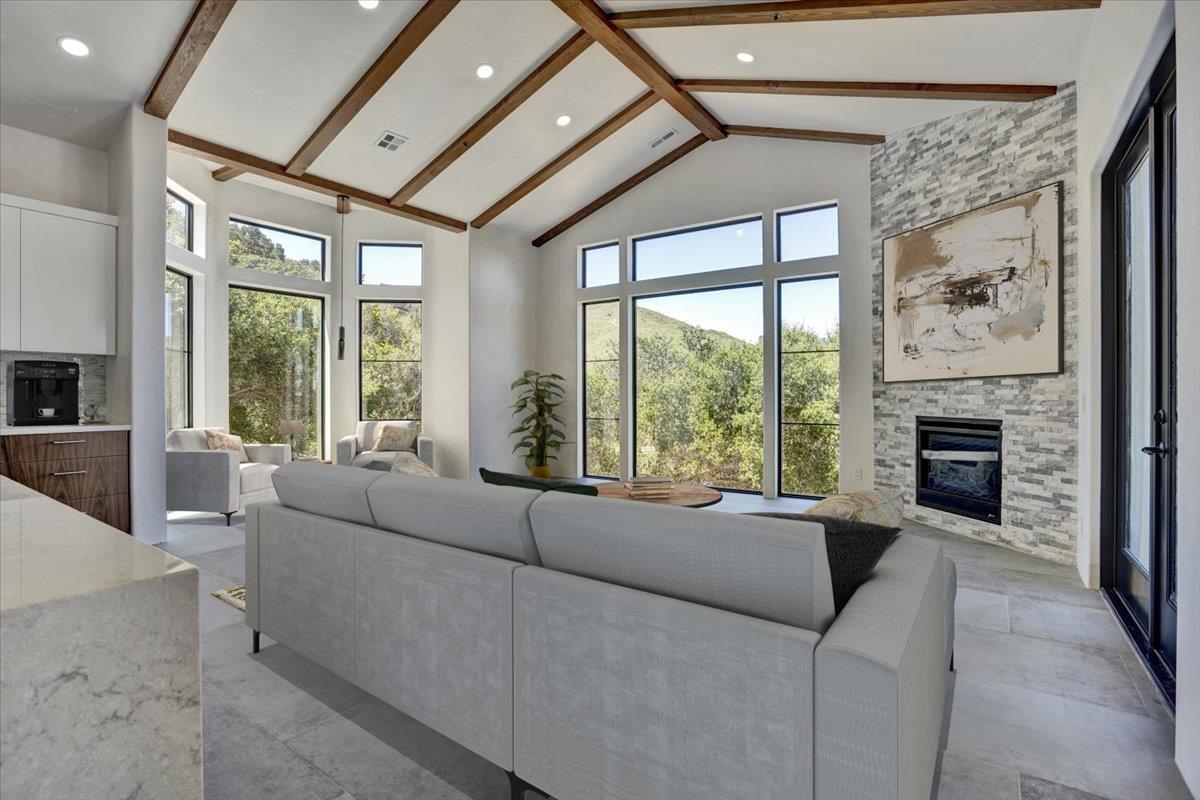 8360 Monterra Views Monterey, CA 93940 - Photo 11 of 82 a living room with furniture a flat screen tv and a fireplace