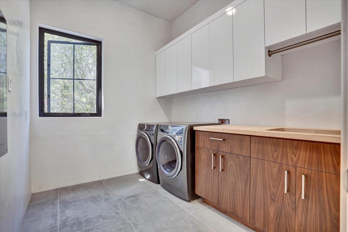 8360 Monterra Views Monterey, CA 93940 - Photo 37 of 82 a utility room with dryer and washer