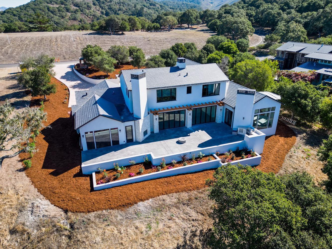 8360 Monterra Views Monterey, CA 93940 - Photo 55 of 82 an aerial view of a house with swimming pool and large trees