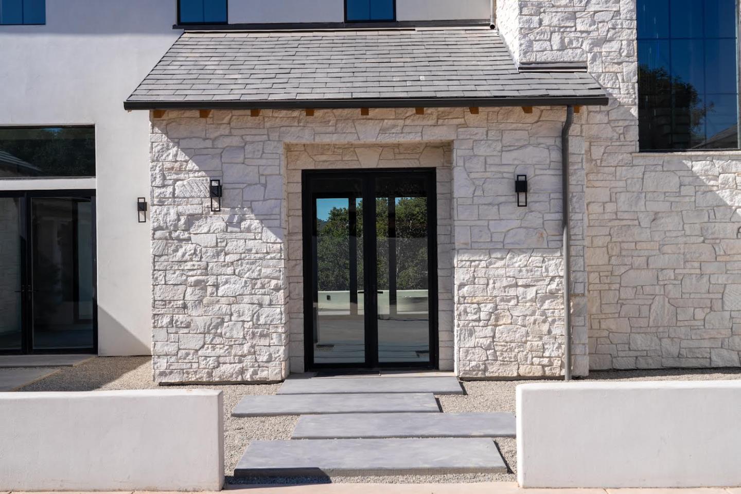 8360 Monterra Views Monterey, CA 93940 - Photo 76 of 82 a front view of a house with large windows