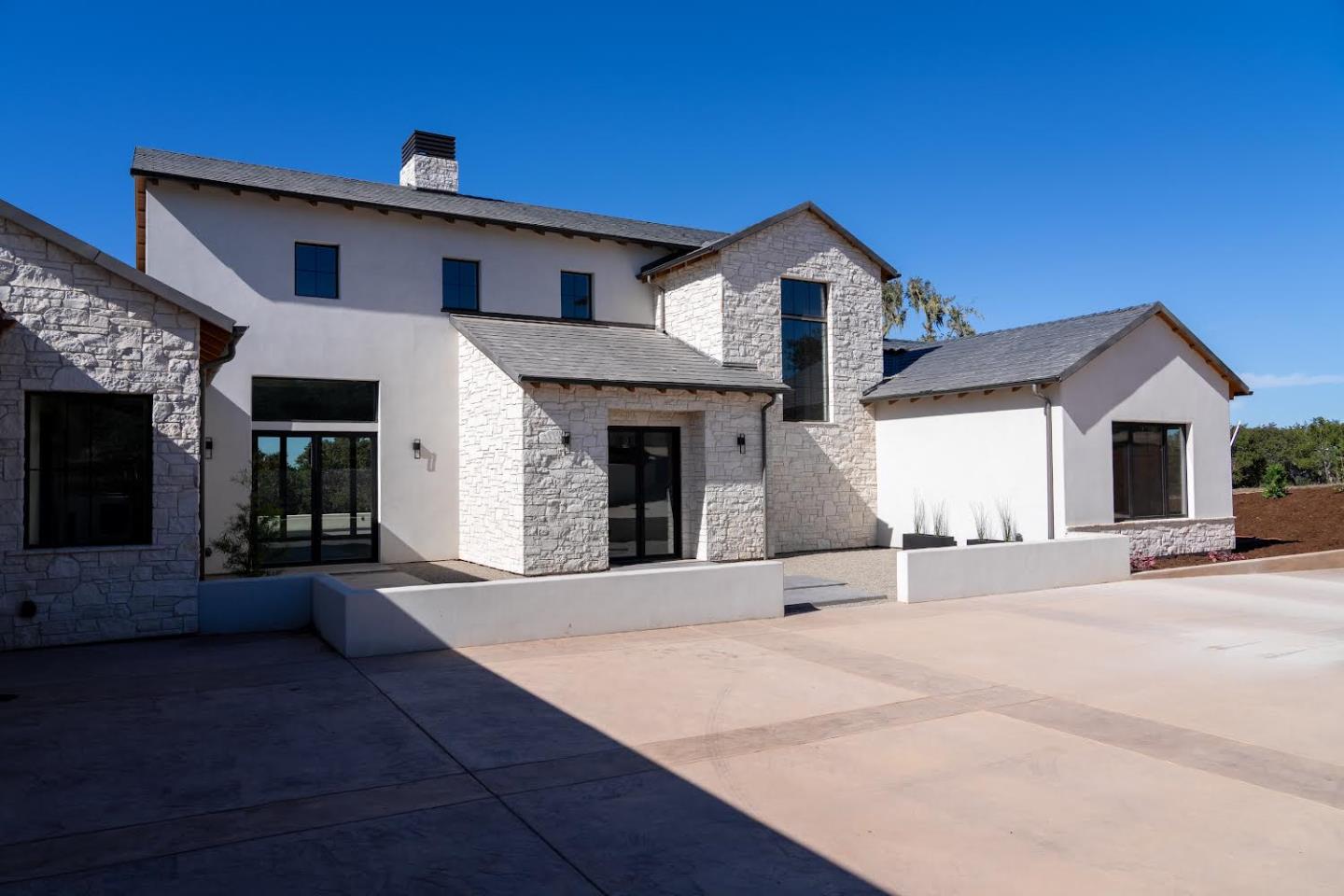 8360 Monterra Views Monterey, CA 93940 - Photo 78 of 82 a front view of a house with a yard and garage