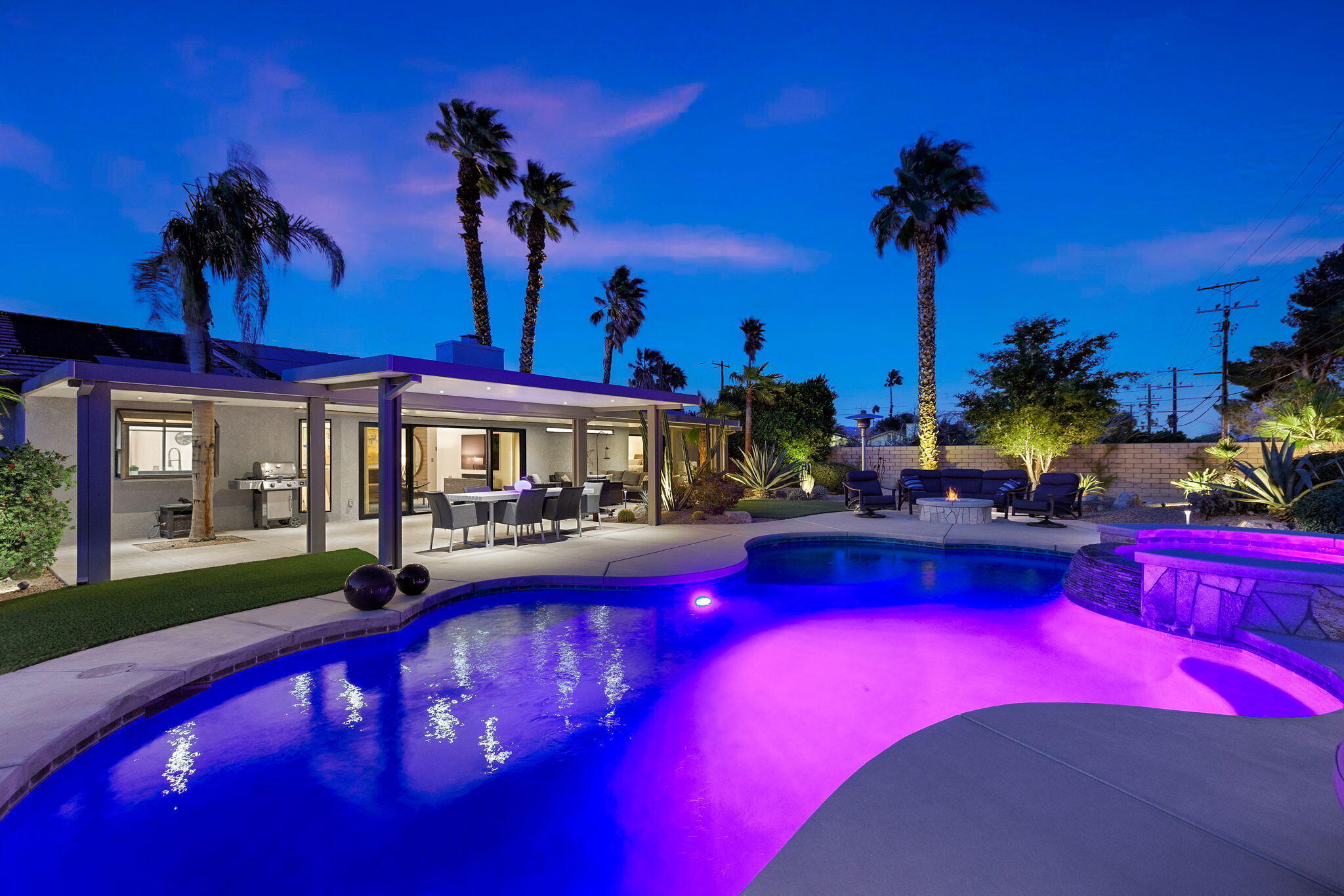 2777 East San Juan Road Palm Springs, CA 92262 - Photo 2 of 31 a view of swimming pool with outdoor seating