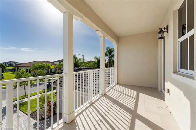 a view of a house with a small yard