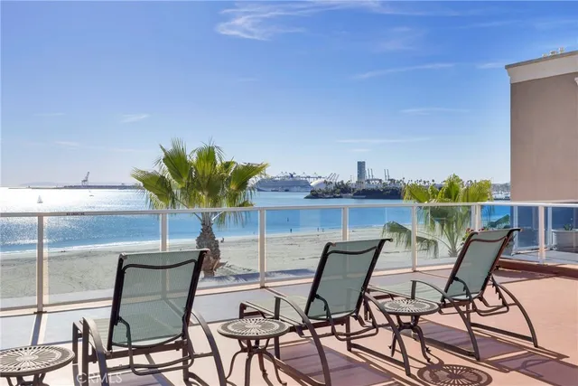 a view of a chairs and table on the terrace