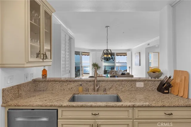 a kitchen with sink and window