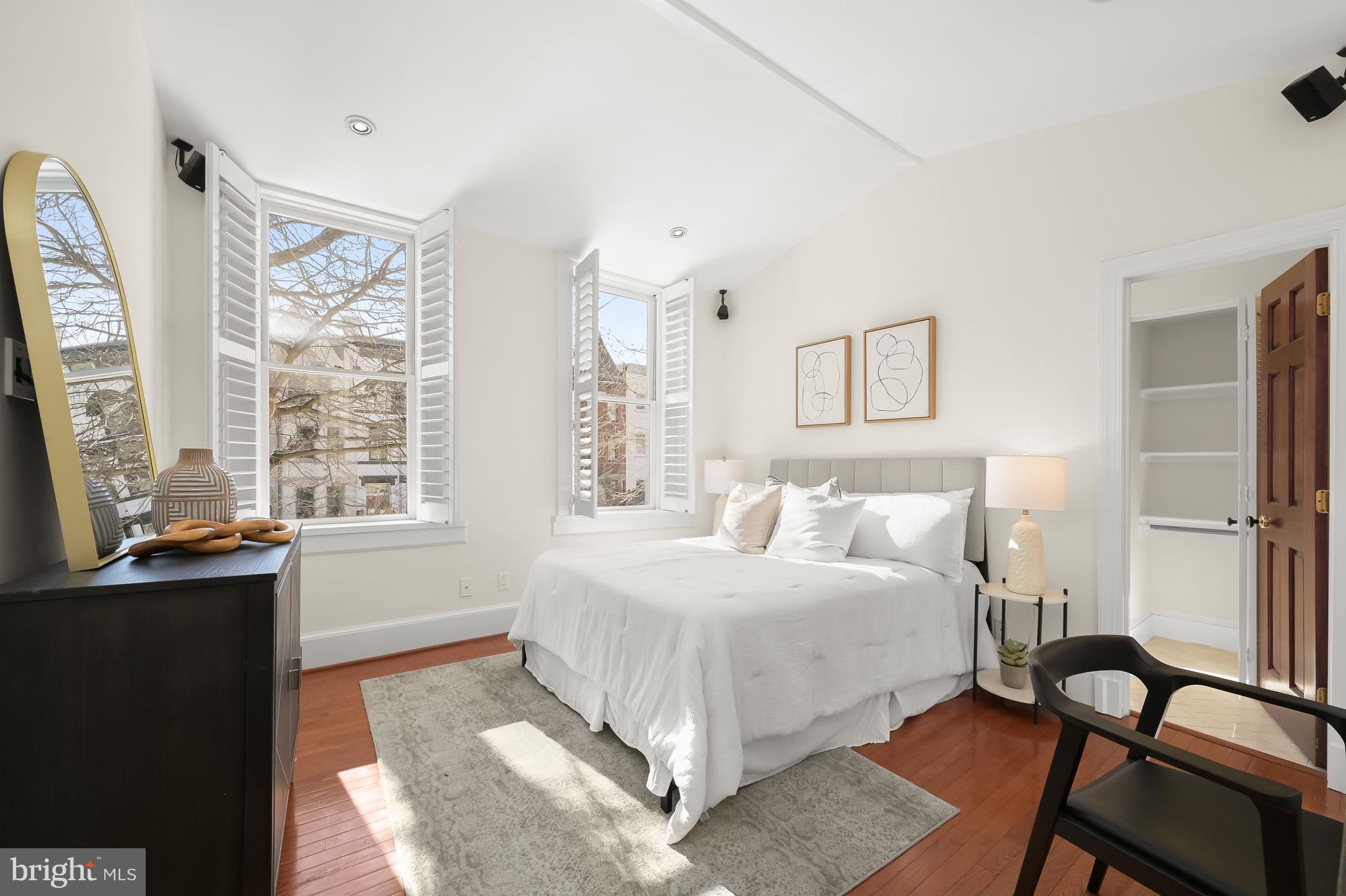 1745 S Street Northwest Washington, DC 20009 - Photo 15 of 19 a bedroom with a large bed and a window