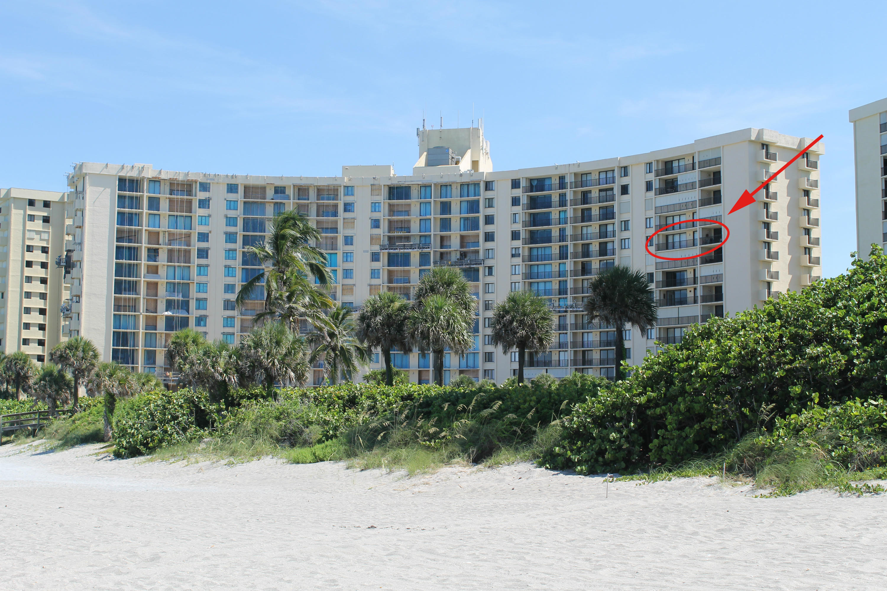 300 Ocean Trail Way, Unit 1010 Jupiter, FL 33477 - Photo 1 of 25 a front view of a multi story building
