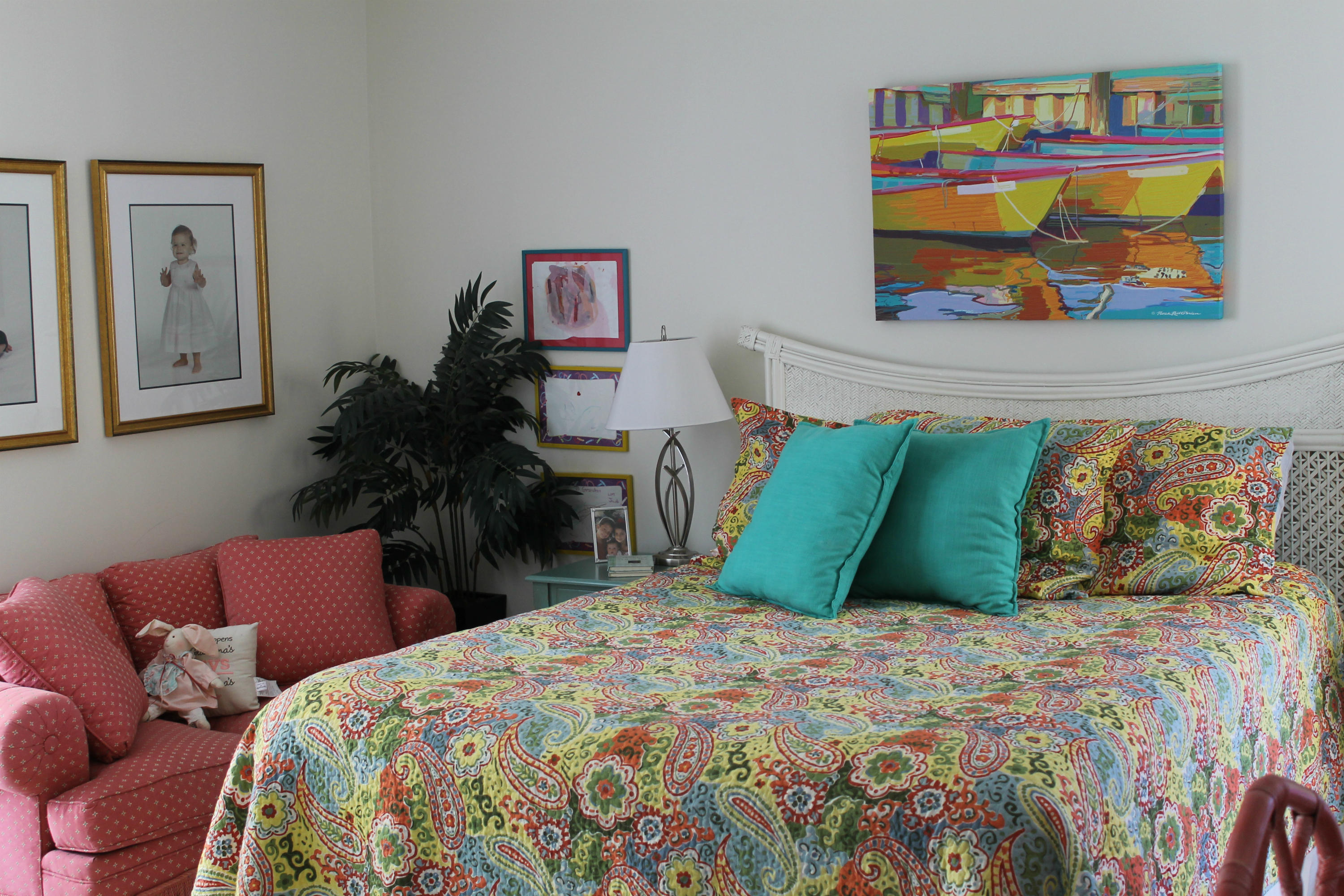 300 Ocean Trail Way, Unit 1010 Jupiter, FL 33477 - Photo 21 of 25 a bedroom with a bed and dresser
