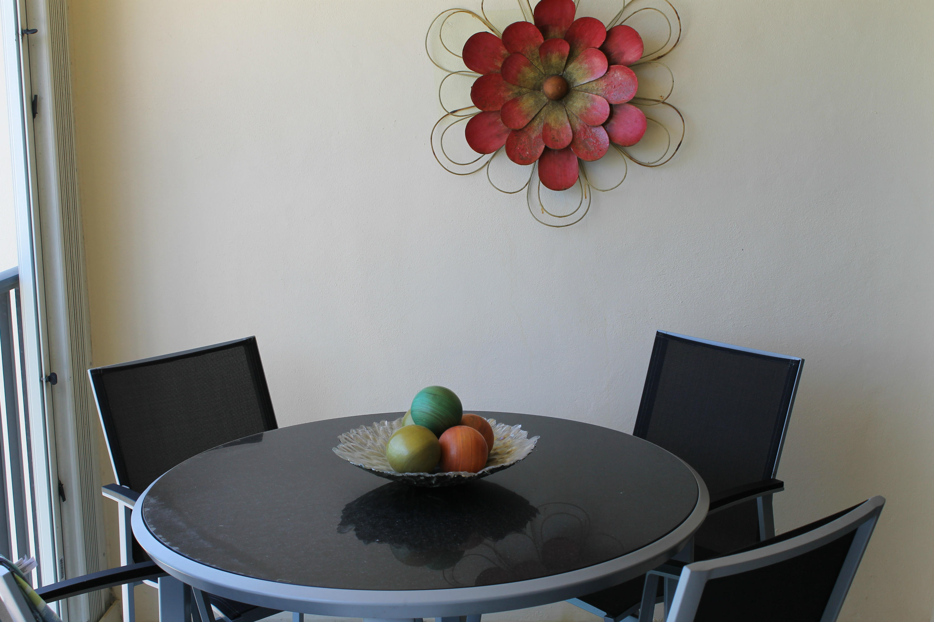 300 Ocean Trail Way, Unit 1010 Jupiter, FL 33477 - Photo 6 of 25 a dining room with furniture and wooden floor