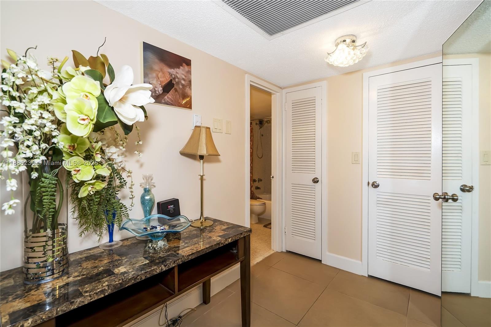 2030 South Ocean Drive, Unit 1118 Hallandale Beach, FL 33009 - Photo 17 of 58 a view of kitchen with furniture and a potted plant