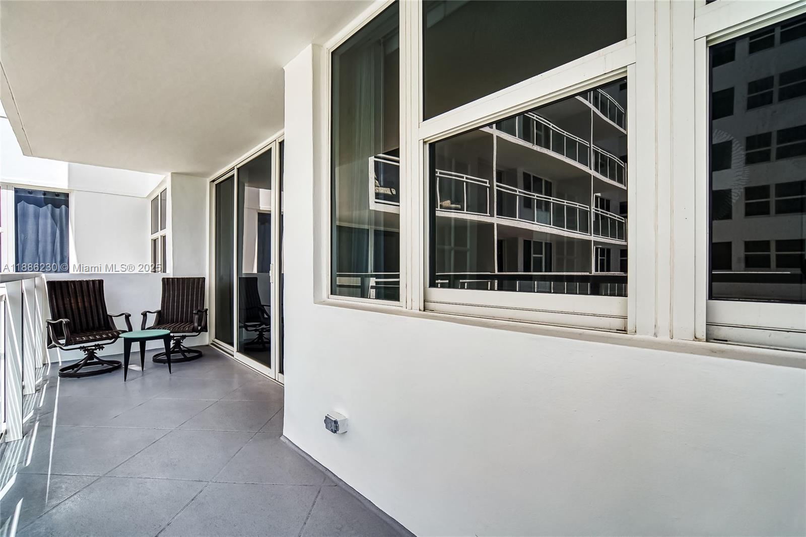 2030 South Ocean Drive, Unit 1118 Hallandale Beach, FL 33009 - Photo 37 of 58 a view of living room with furniture and large window