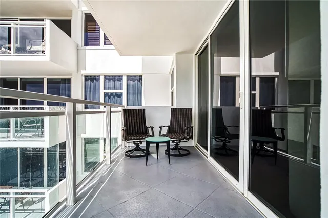 a view of a building with an ocean