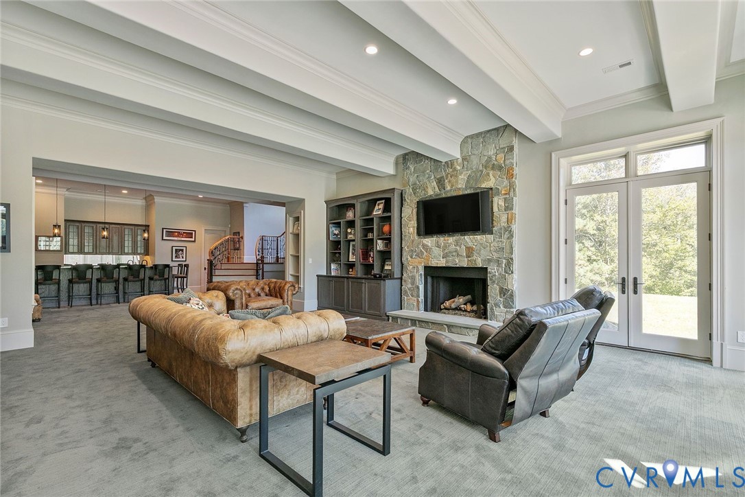 785 Oak Spring Lane Manakin-Sabot, VA 23103 - Photo 66 of 96 Spacious rec room with beams, stone gas fireplace,
