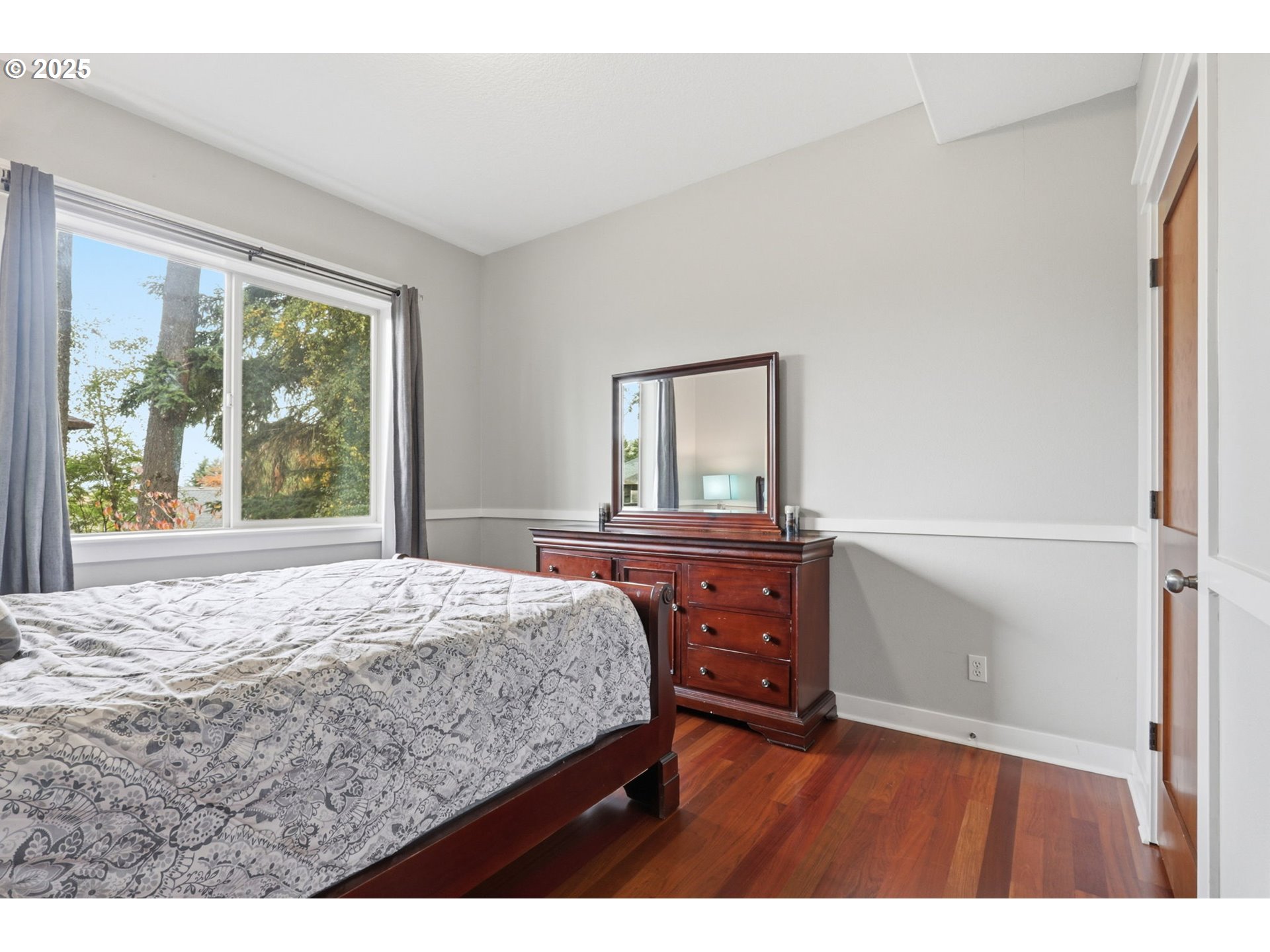 937 Southwest Florence Court Gresham, OR 97080 - Photo 12 of 47 a bedroom with a bed and a window