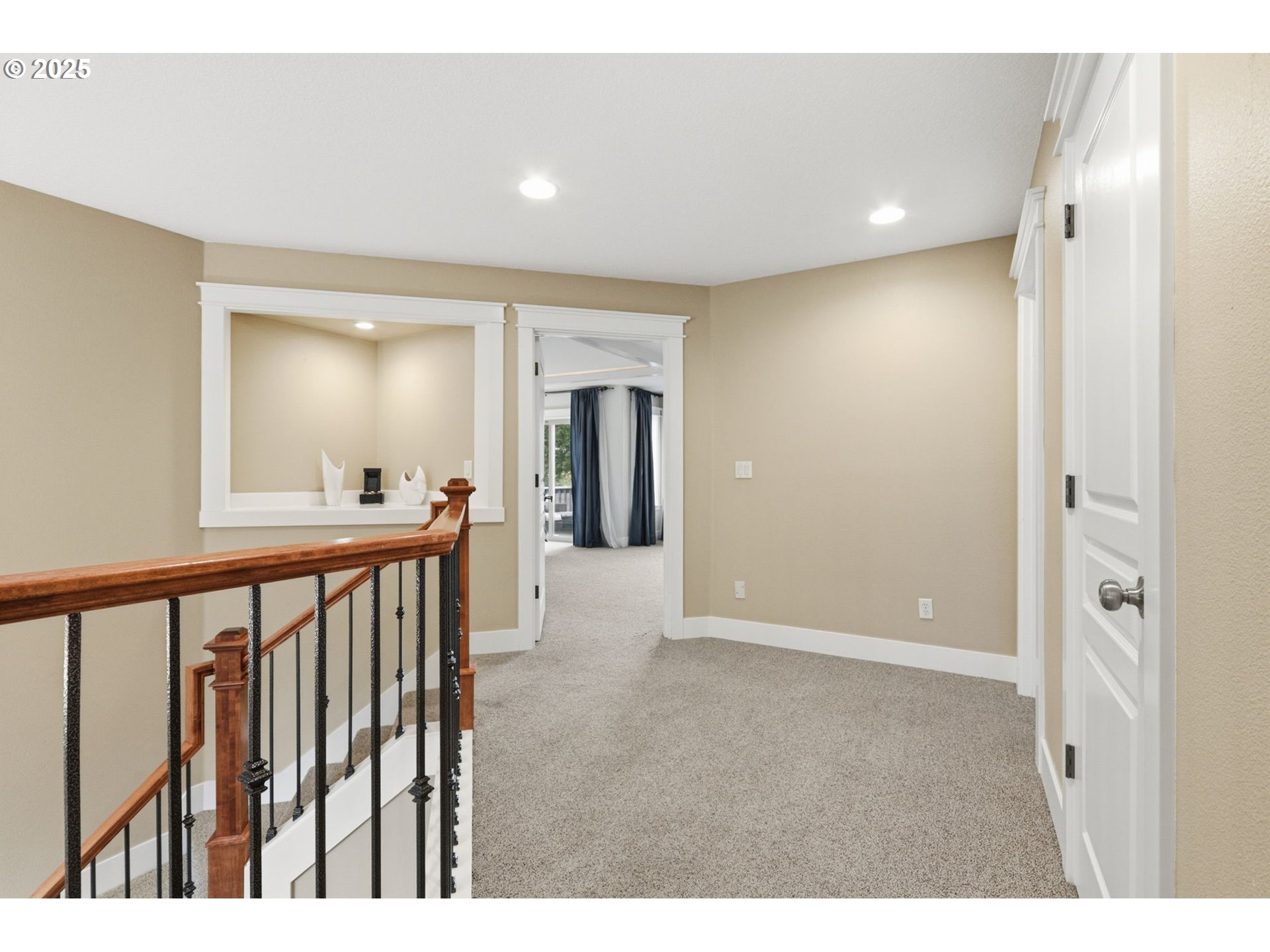 937 Southwest Florence Court Gresham, OR 97080 - Photo 17 of 47 a view of a hallway with wooden floor and windows