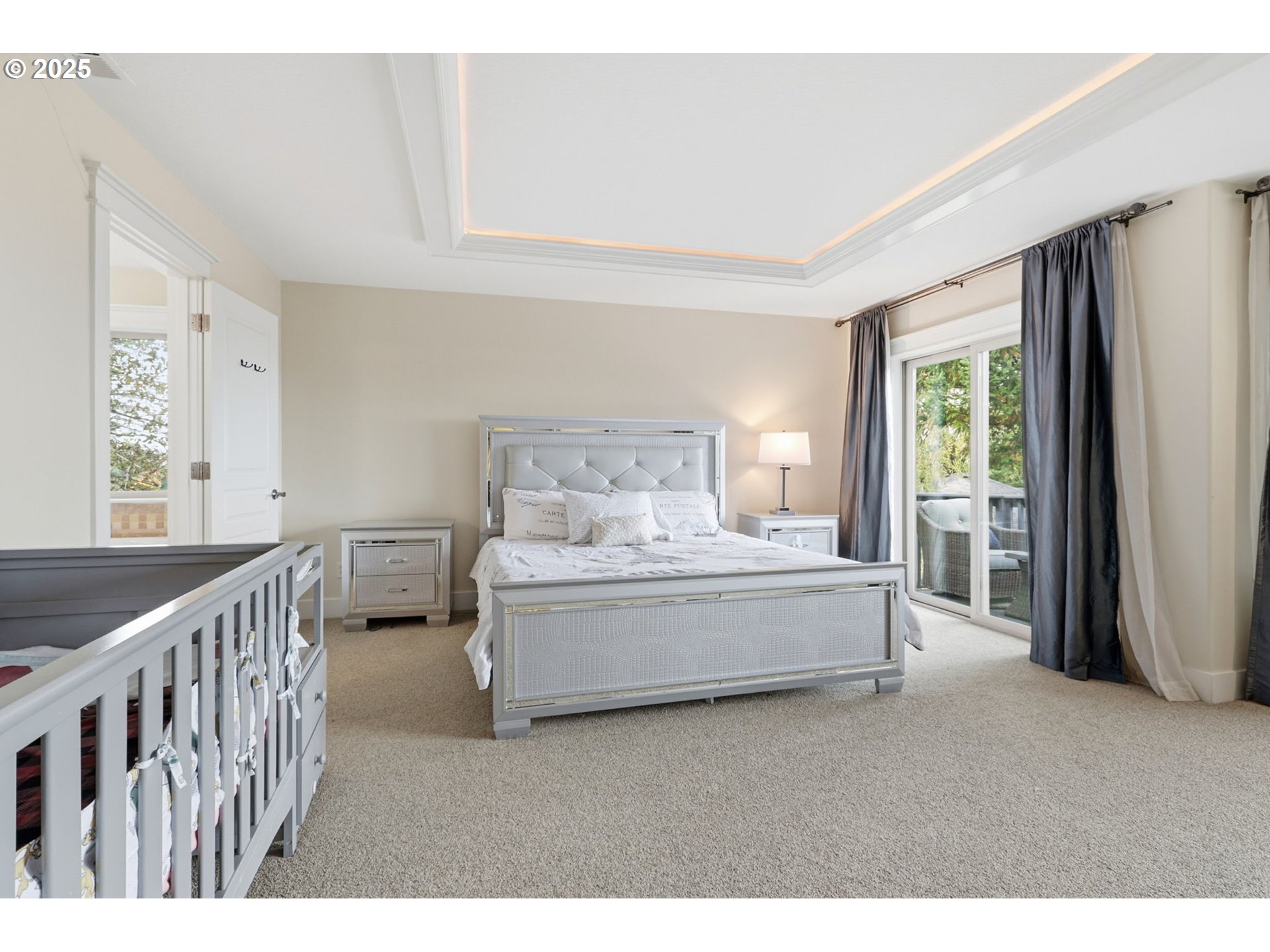 937 Southwest Florence Court Gresham, OR 97080 - Photo 20 of 47 a spacious bedroom with a bed and a window