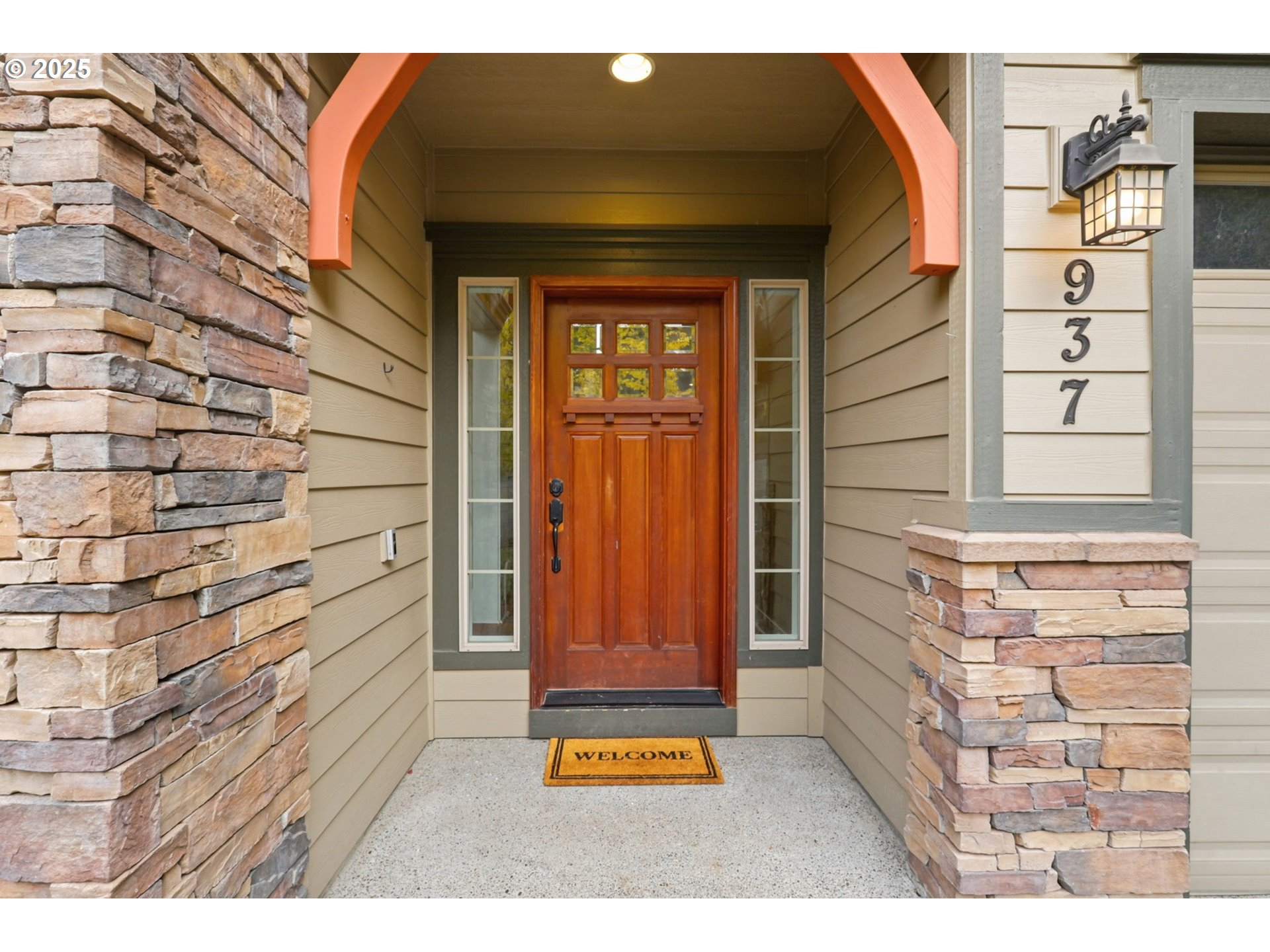 937 Southwest Florence Court Gresham, OR 97080 - Photo 2 of 47 a view of front door of house with a potted plant