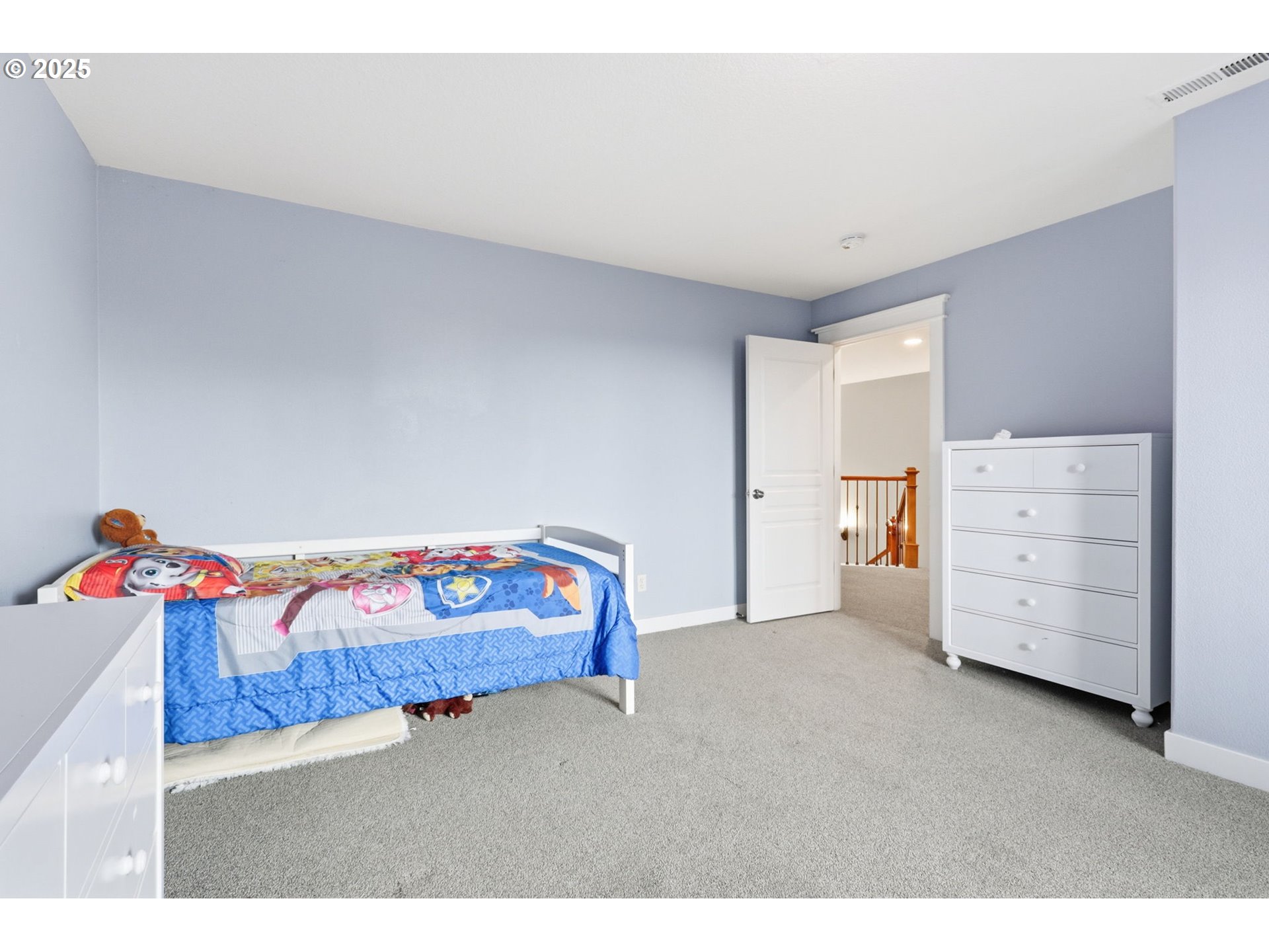 937 Southwest Florence Court Gresham, OR 97080 - Photo 27 of 47 a bedroom with a bed and a window