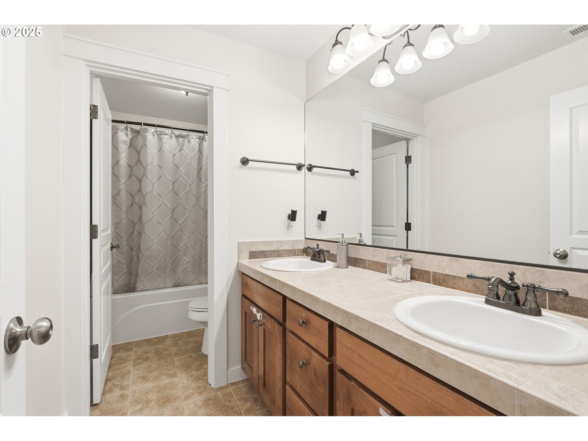 937 Southwest Florence Court Gresham, OR 97080 - Photo 28 of 47 a bathroom with a sink a vanity and a mirror