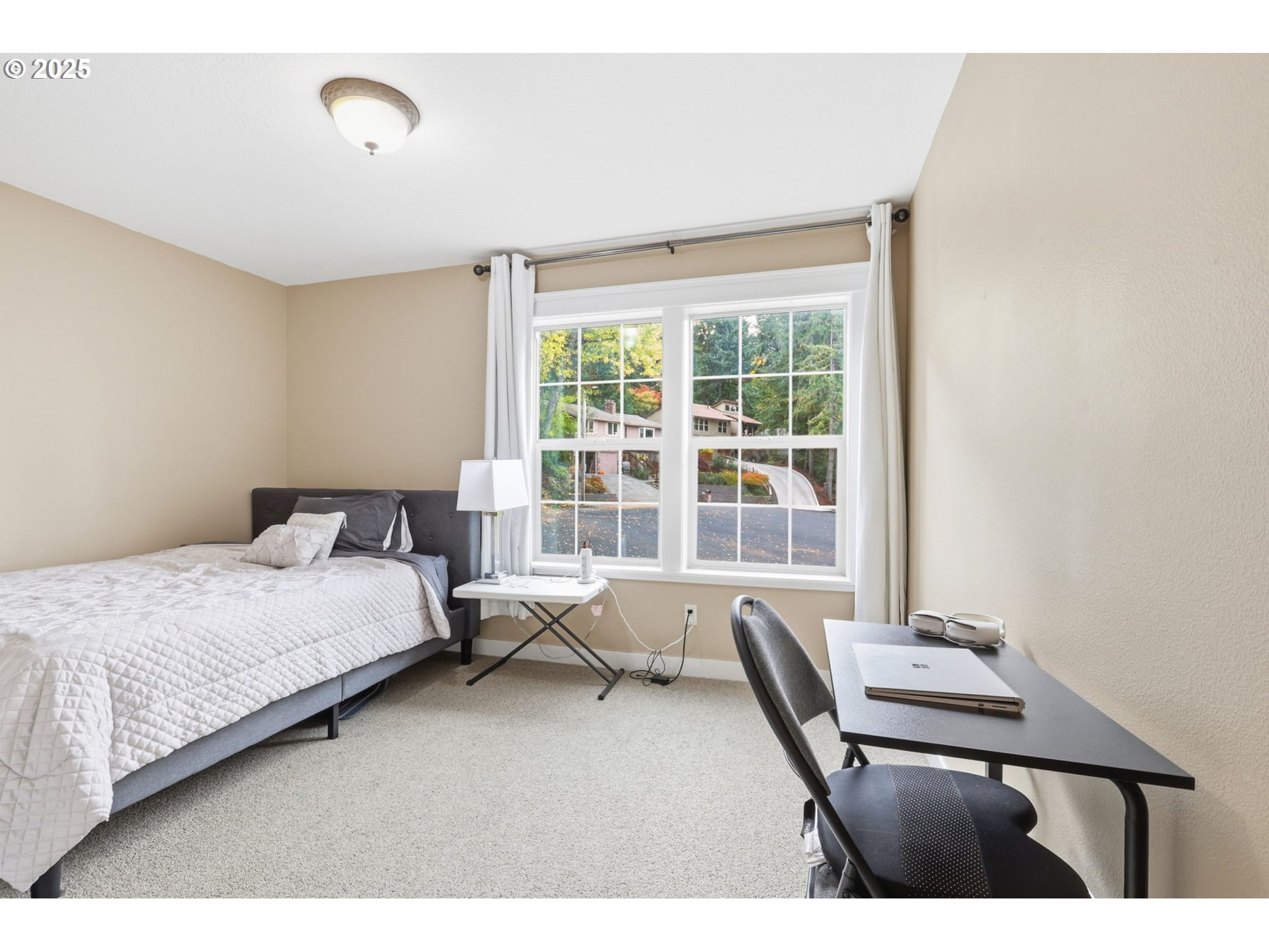 937 Southwest Florence Court Gresham, OR 97080 - Photo 29 of 47 a bedroom with a bed and a window