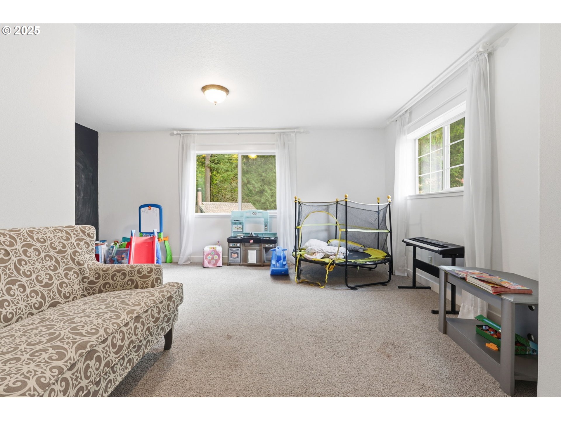 937 Southwest Florence Court Gresham, OR 97080 - Photo 32 of 47 a living room with furniture and a couch