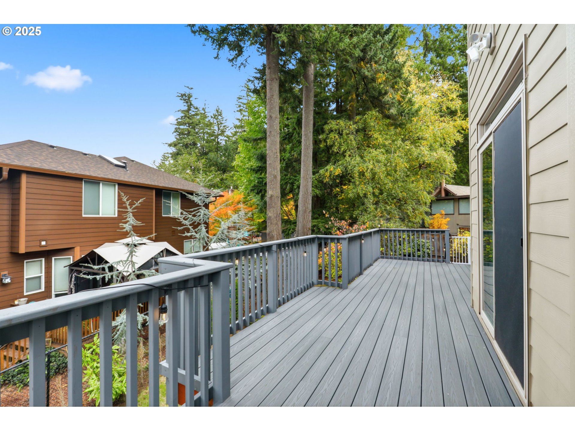 937 Southwest Florence Court Gresham, OR 97080 - Photo 33 of 47 a balcony with wooden floor in front of house